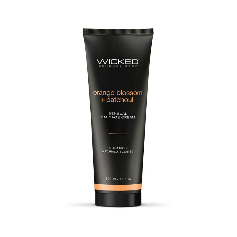 Black tube of Wicked Sensual Care massage cream with orange text on a white background